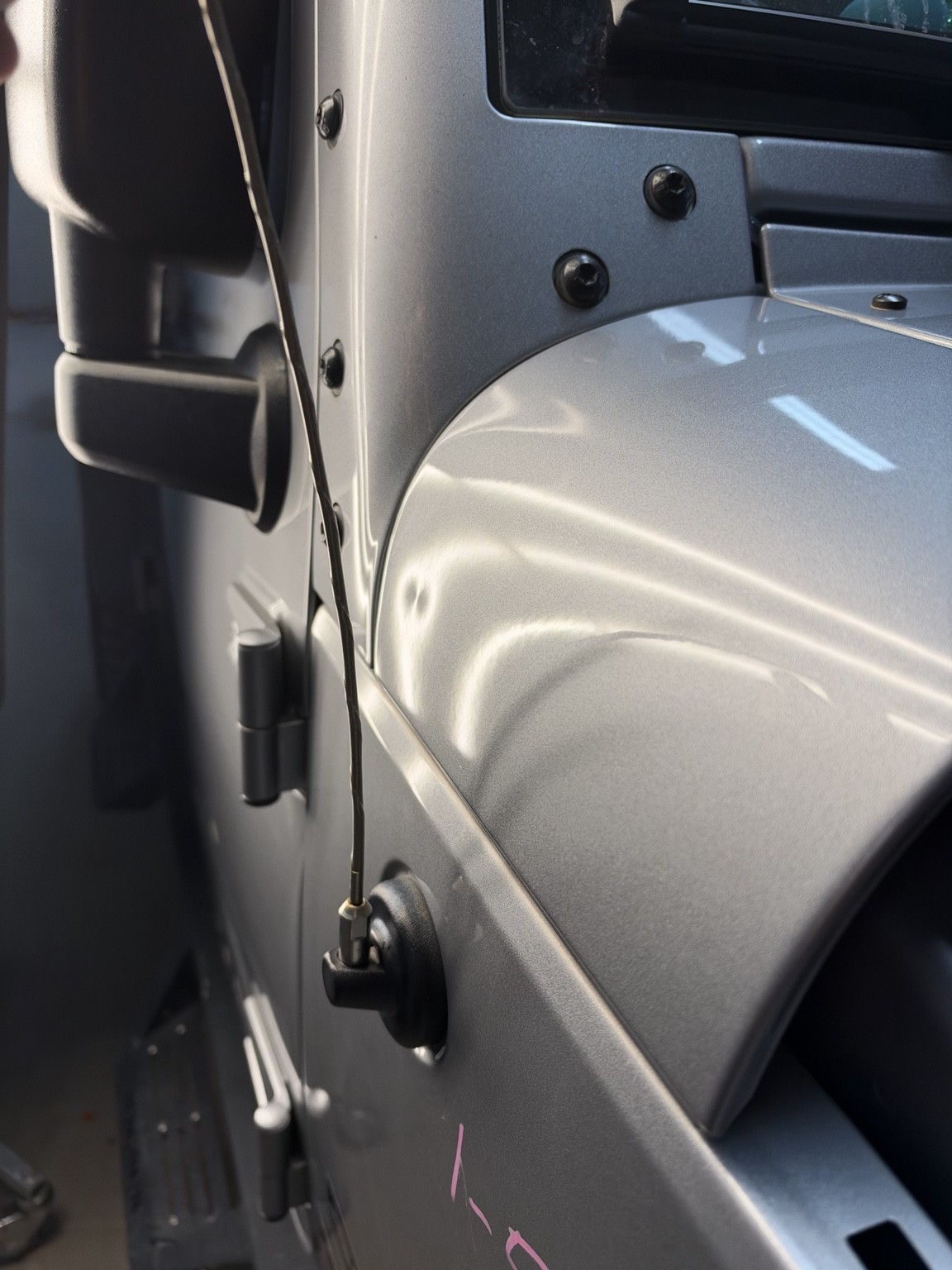 Panel before repair with visible dent