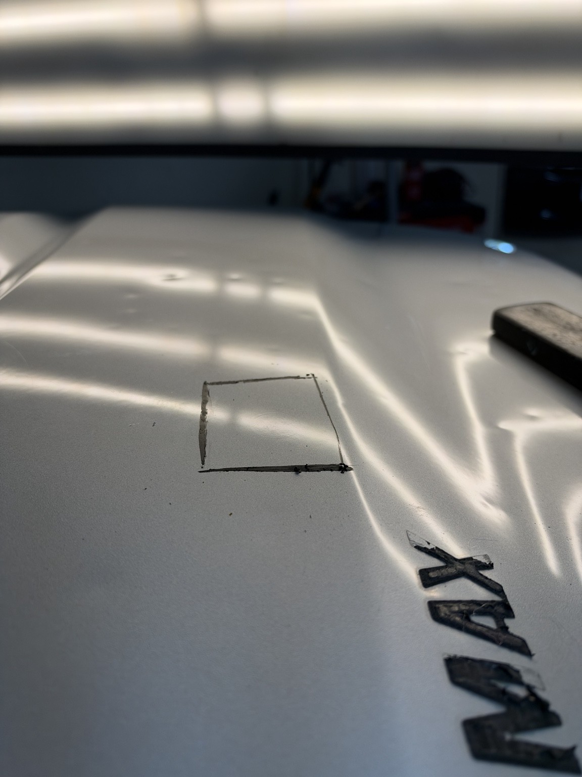 After: marked area following the individual dent repair